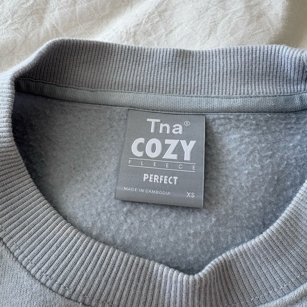 TNA light blue cropper crew neck sweatshirt